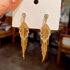 Close-up detail of the sparkling zircons and plating on the Leaf Tassel Earrings