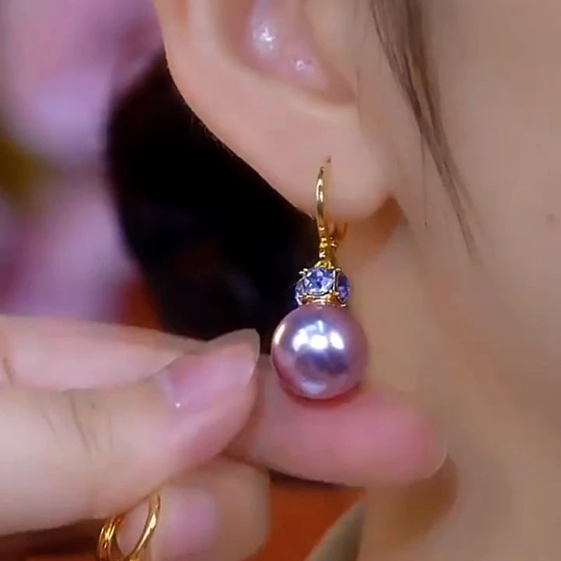 Close-up detail of the sparkling zircons and plating on the Purple Crystal Earrings
