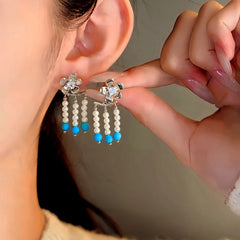 14K Gold-Plated Elegant Dimond Flower Pearl Tassel Earrings worn to showcase its length and pendant detail