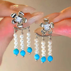 Close-up of the pendant and clasp on the Pearl Tassel Necklace