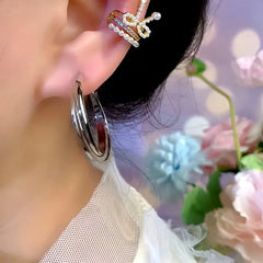 Angled view of the 14K Gold-Plated Elegant Double-Layer Hoop Earrings