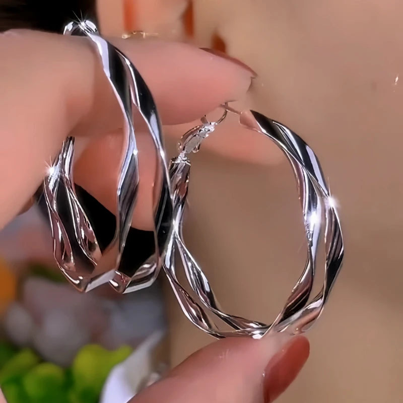 Close-up detail of the sparkling zircons and plating on the Double Layer Hoops