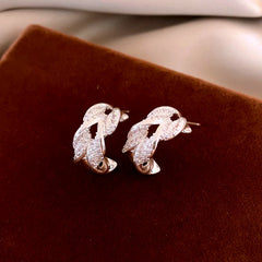 Angled view of the 14K Gold-Plated Elegant Double-Layer Zircon C-Shaped Earrings