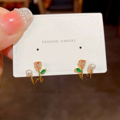 Close-up detail of the sparkling zircons and plating on the Rose Pearl Studs