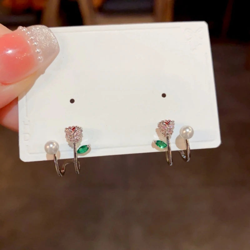 Angled view of the 14K Gold-Plated Elegant Double-Layer Zircon Rose Pearl Stud Earrings