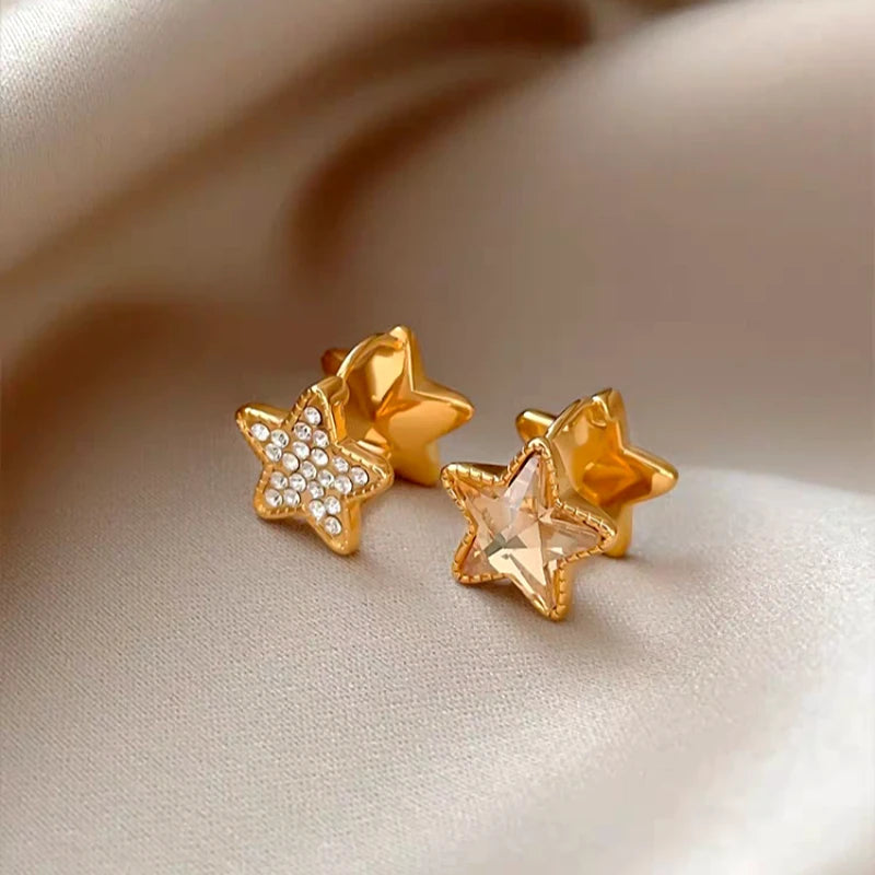 Angled view of the 14K Gold-Plated Elegant Double-Sided Five-Pointed Star Earrings