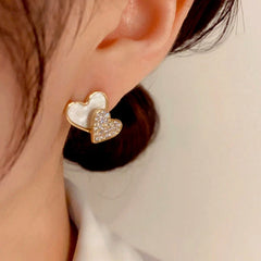 Close-up detail of the sparkling zircons and plating on the Double Heart Studs