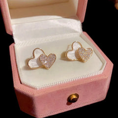 Angled view of the 14K Gold-Plated Elegant Double Heart Stud Earrings