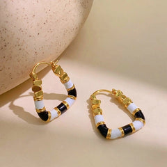 Detailed view of the sparkling accents on the Enamel Drop Earrings