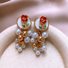 Angled view of the 14K Gold-Plated Elegant Flower Bead Tassel Earrings