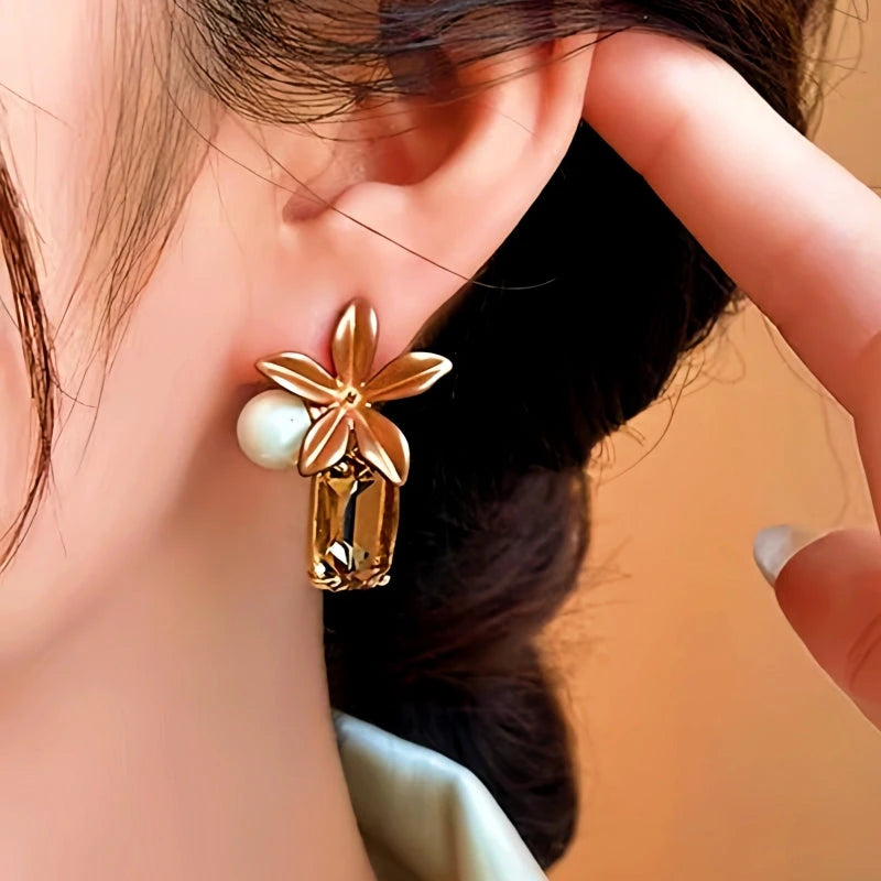 Close-up detail of the sparkling zircons and plating on the Pearl Crystal Earrings