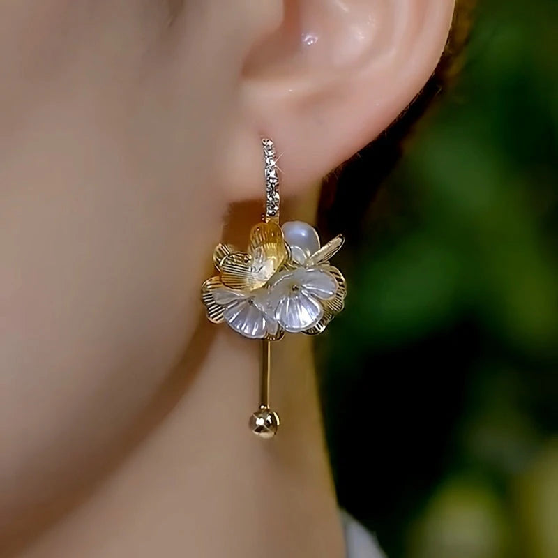 Close-up detail of the sparkling zircons and plating on the Flower Tassel Earrings