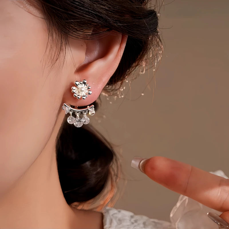 Close-up detail of the sparkling zircons and plating on the Flower Tassel Ear Jackets