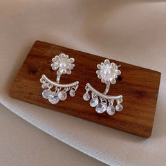 Angled view of the 14K Gold-Plated Elegant Flower Zircon Tassel Earrings