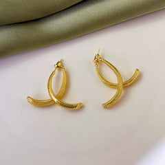 Close-up detail of the sparkling zircons and plating on the Front and Back Earrings