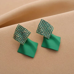 Styling the Geometric Vintage Earrings for a chic and modern look