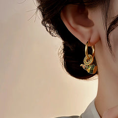 Angled view of the 14K Gold-Plated Elegant Gourd Fortune Earrings