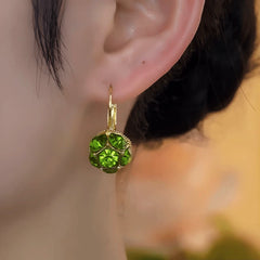 Close-up detail of the sparkling zircons and plating on the Green Diamond Earrings