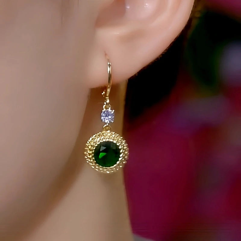 Close-up detail of the sparkling zircons and plating on the Green Zircon Earrings