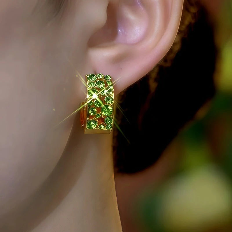 Close-up detail of the sparkling zircons and plating on the Green Zircon Hoops