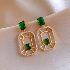 Model showcasing the dangle and style of the 14K Gold-Plated Elegant Green Zircon Diamond Rectangular Earrings