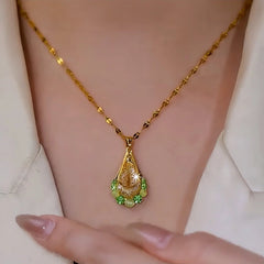 Close-up of the pendant and clasp on the Green Zircon Necklace