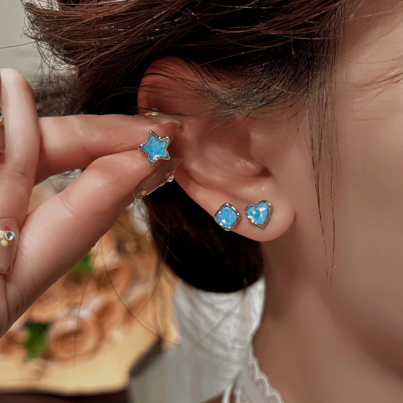 Close-up detail of the sparkling zircons and plating on the Star Stud Earrings