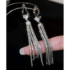 Close-up detail of the sparkling zircons and plating on the Heart Tassel Earrings