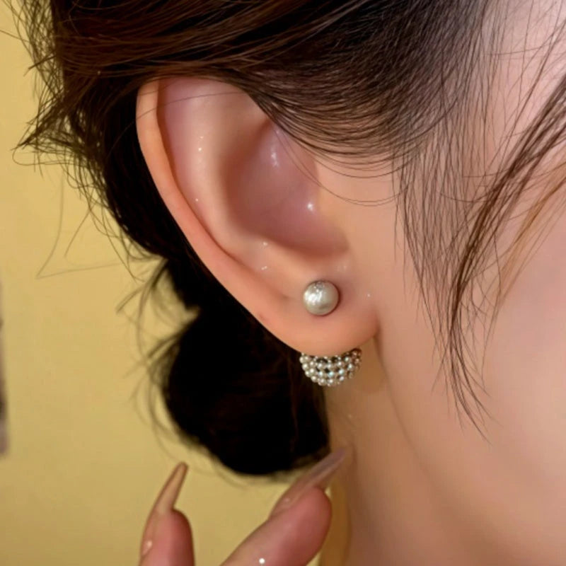 Close-up detail of the sparkling zircons and plating on the Ball Jacket Earrings