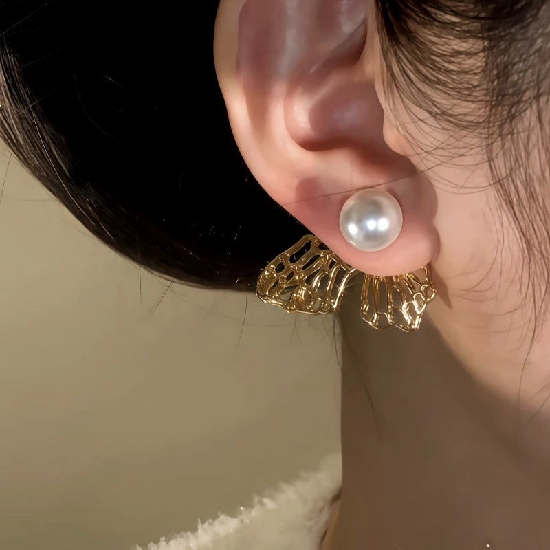 Close-up detail of the sparkling zircons and plating on the Pearl Butterfly Earrings