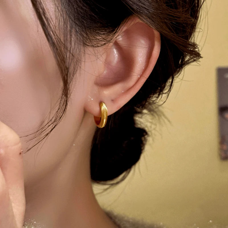 Angled view of the 14K Gold-Plated Elegant Hoop Earrings