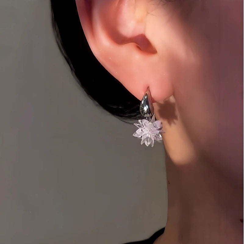 Close-up detail of the sparkling zircons and plating on the Ice Flower Earrings