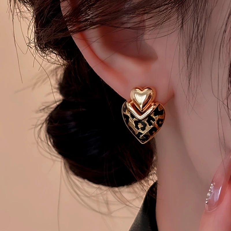 Close-up detail of the sparkling zircons and plating on the Leopard Heart Earrings
