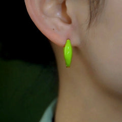 Close-up detail of the sparkling zircons and plating on the Little Hoop Earrings