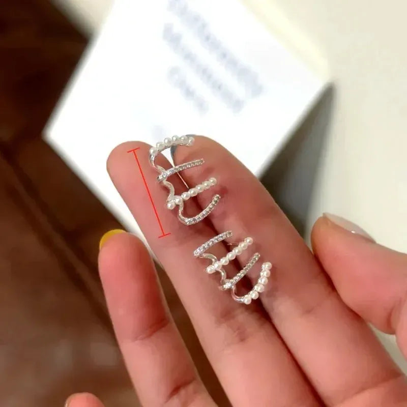 Angled view of the 14K Gold-Plated Elegant Multi-Layer Zircon Pearl Stud Earrings