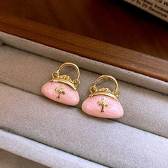 Angled view of the 14K Gold-Plated Elegant Oil Drop Bag Earrings