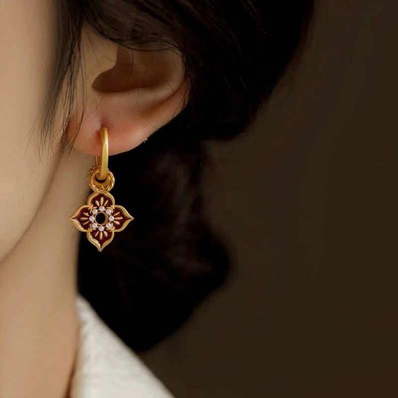Close-up detail of the sparkling zircons and plating on the Painted Glaze Earrings