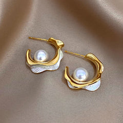 Angled view of the 14K Gold-Plated Elegant Pearl C-Shaped Earrings