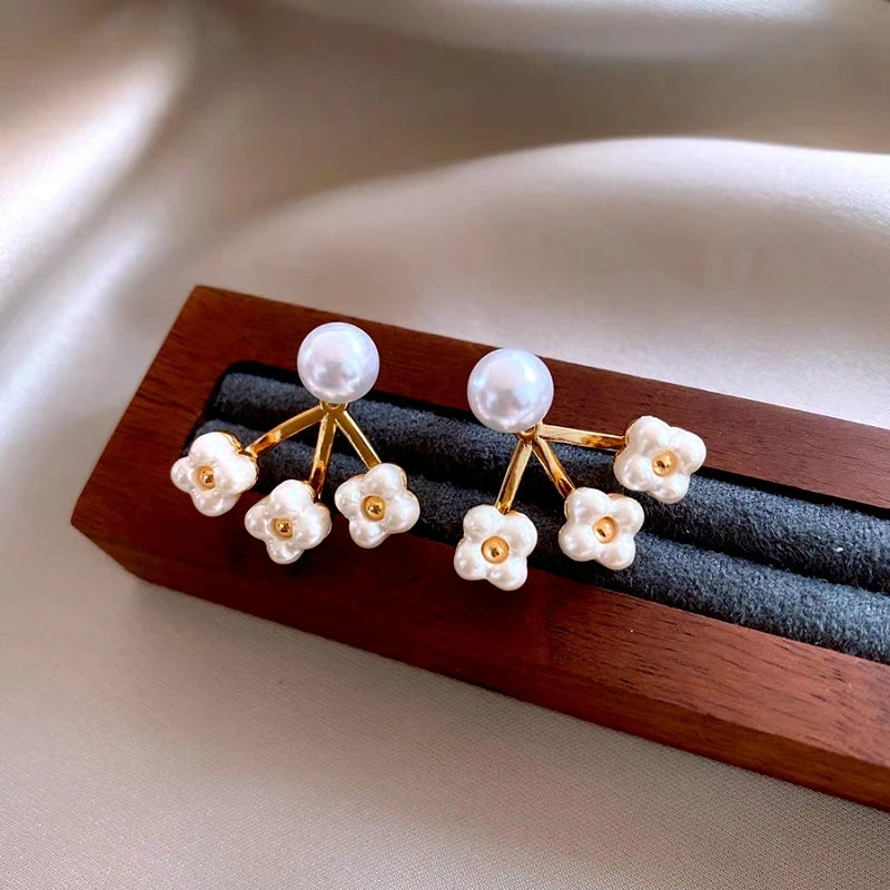 Close-up detail of the sparkling zircons and plating on the Pearl Flower Jacket Earrings