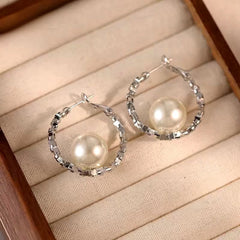 Angled view of the 14K Gold-Plated Elegant Pearl Hoop Earrings
