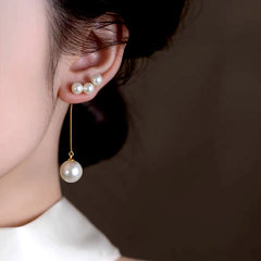 Close-up detail of the sparkling zircons and plating on the Pearl Tassel Earrings