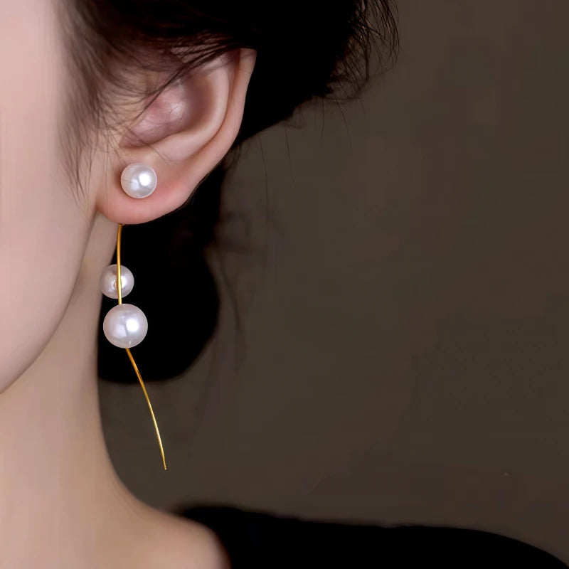 Close-up detail of the sparkling zircons and plating on the Pearl Tassel Earrings