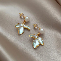 Angled view of the 14K Gold-Plated Elegant Petal Pearl Earrings