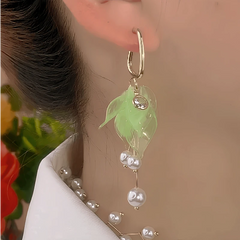 Angled view of the 14K Gold-Plated Elegant Petal Pearl Tassel Earrings