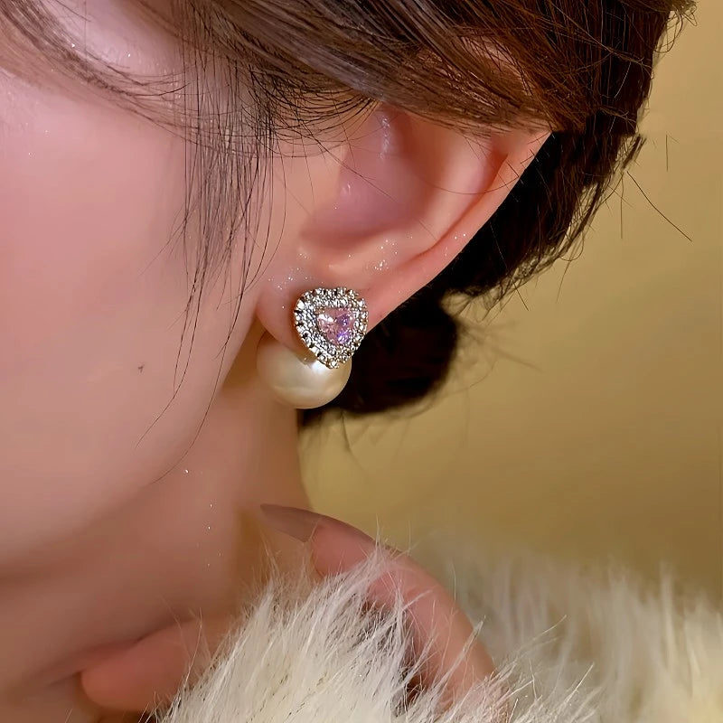 Angled view of the 14K Gold-Plated Elegant Pink Diamond Heart Pearl Earrings