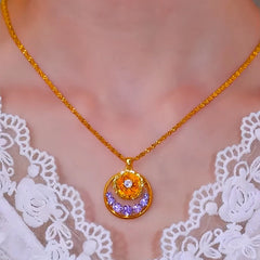 Close-up of the pendant and clasp on the Purple Rose Necklace