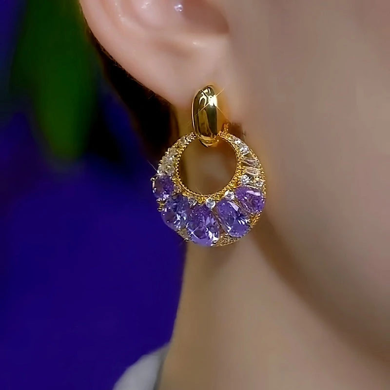 Close-up detail of the sparkling zircons and plating on the Purple Tassel Earrings