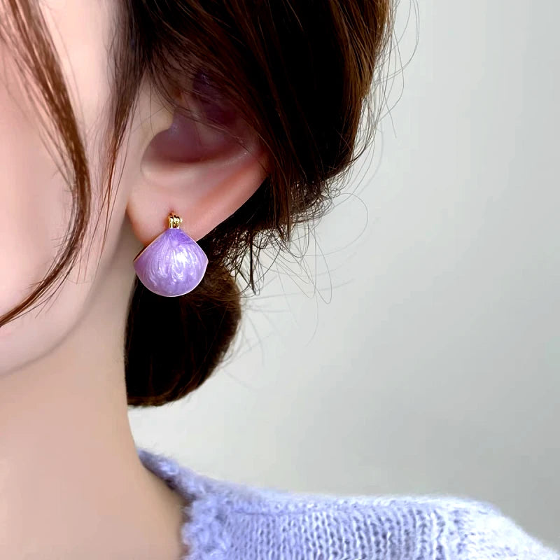 Close-up detail of the sparkling zircons and plating on the Purple Basket Earrings