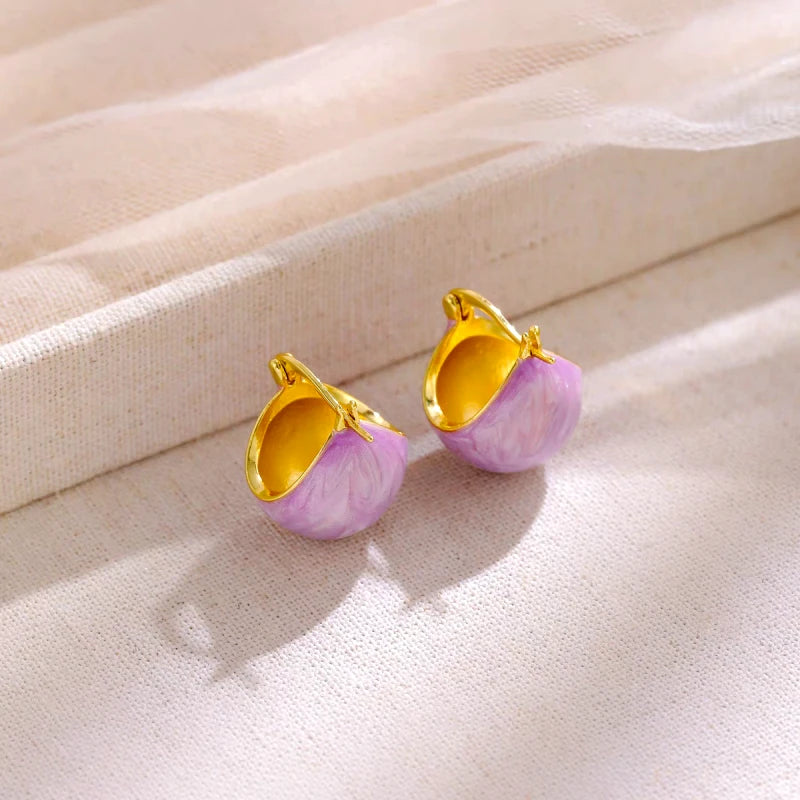 Angled view of the 14K Gold-Plated Elegant Purple Oil Drop Basket Earrings