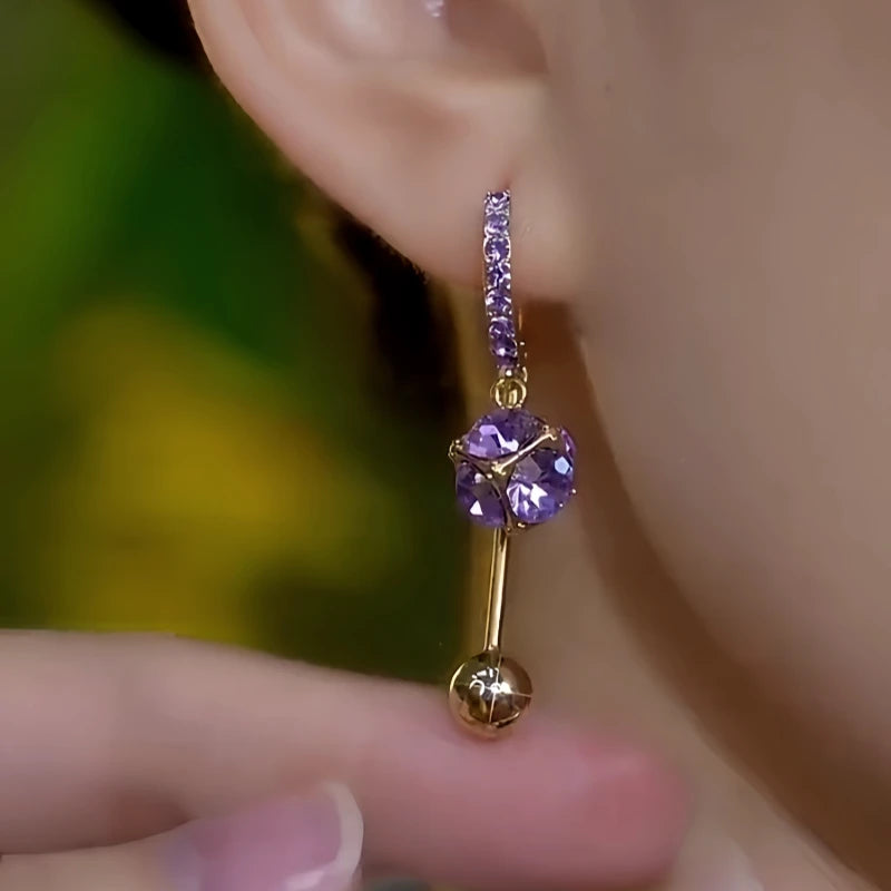 Close-up detail of the sparkling zircons and plating on the Purple Tassel Earrings